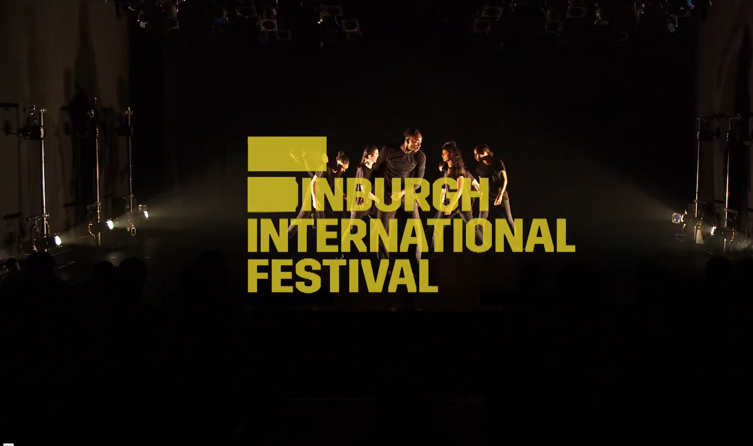 EIF logo with a dark stage and dancers behind it
